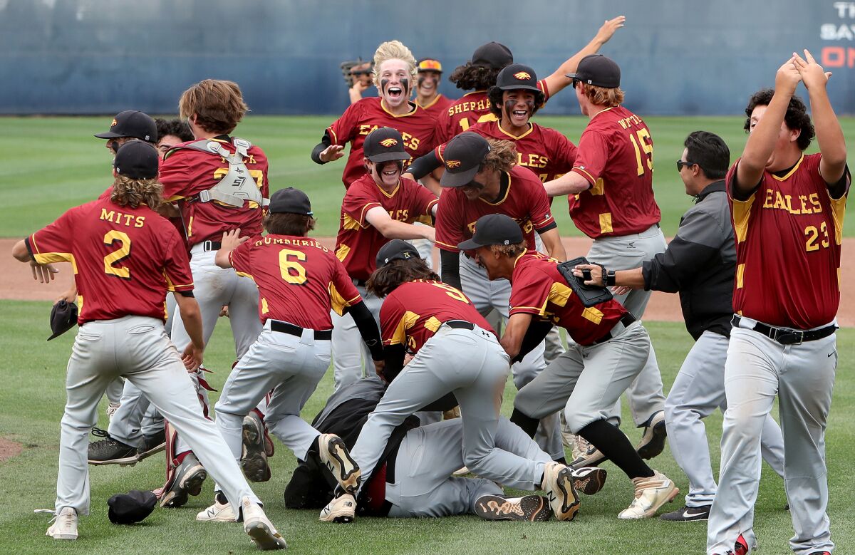 The Estancia High baseball team celebrates beating Anaheim 2-1 in the CIF Southern Section Division 6 title game Saturday.