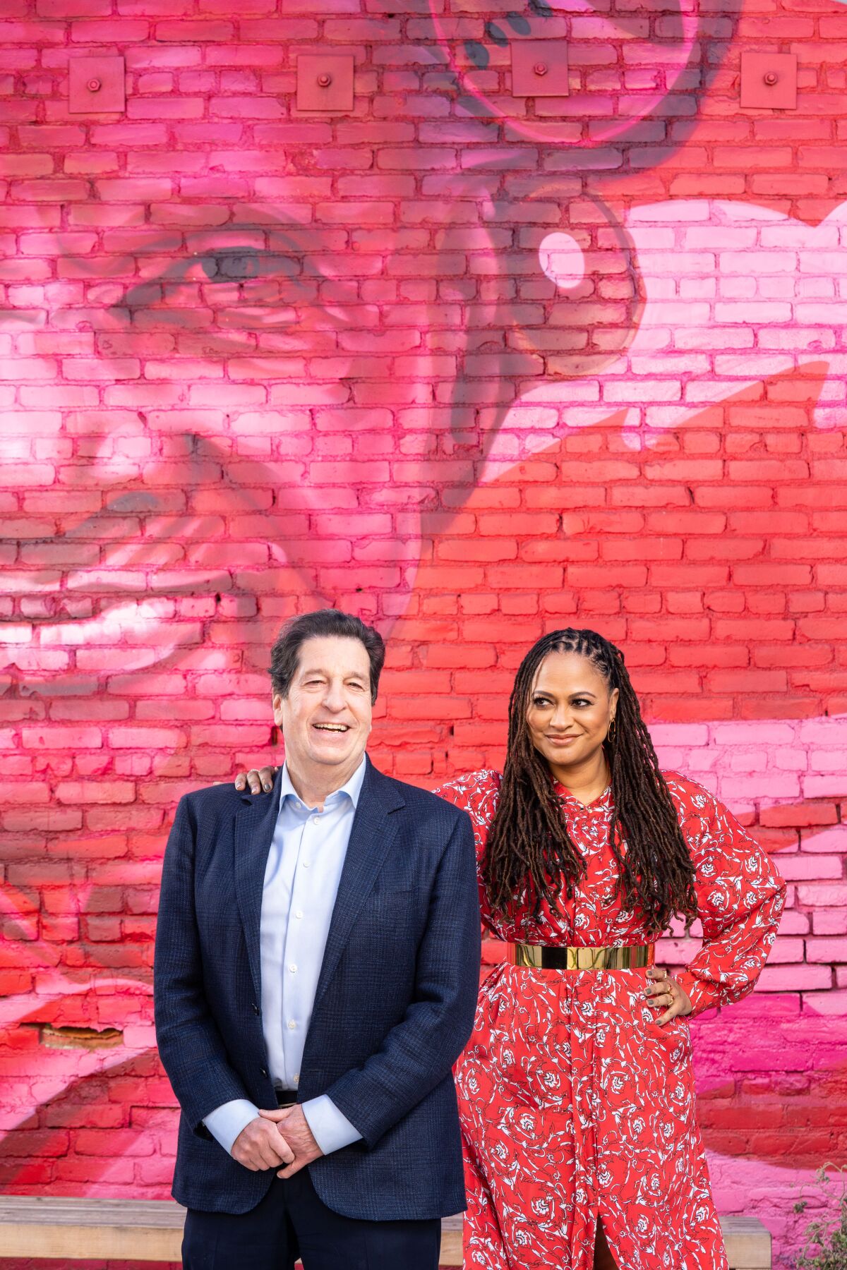Outgoing Warner Bros. TV executive Peter Roth and filmmaker Ava Duvernay