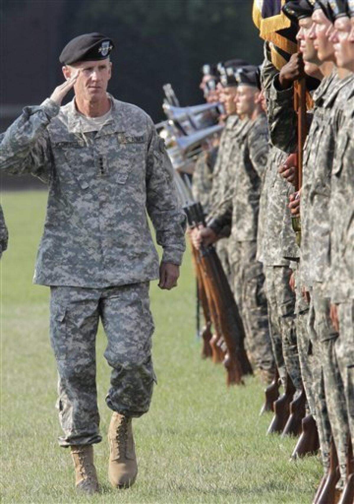 Gen. Stanley McChrystal reviews troops for the last time as he is honored at a retirement ceremony at Fort McNair in Washington, Friday, July 23, 2010. McChrystal's illustrious career came to an abrupt end when he resigned as the top U.S. commander in Afghanistan after he and his staff were quoted in a Rolling Stone magazine article criticizing and mocking key Obama Administration officials. (AP Photo/J. Scott Applewhite) — AP