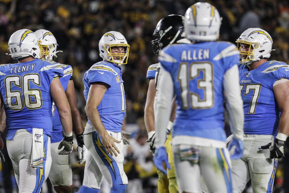 Chargers quarterback Philip Rivers (17) has words with receiver Keenan Allen after a missed connection against the Pittsburgh Steelers at Dignity Health Sports Park on Sunday.