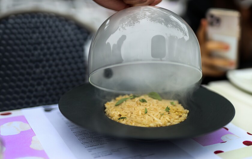 Risotto Fugazetta, a wood-smoked pasta dish at Semola, an Ambrogio 15 Gastronomy Project, which opened May 22 in La Jolla.