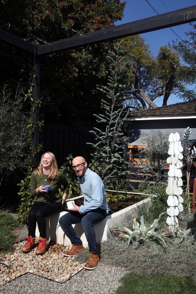 Allison and Jeremy Glatstein in their backyard.