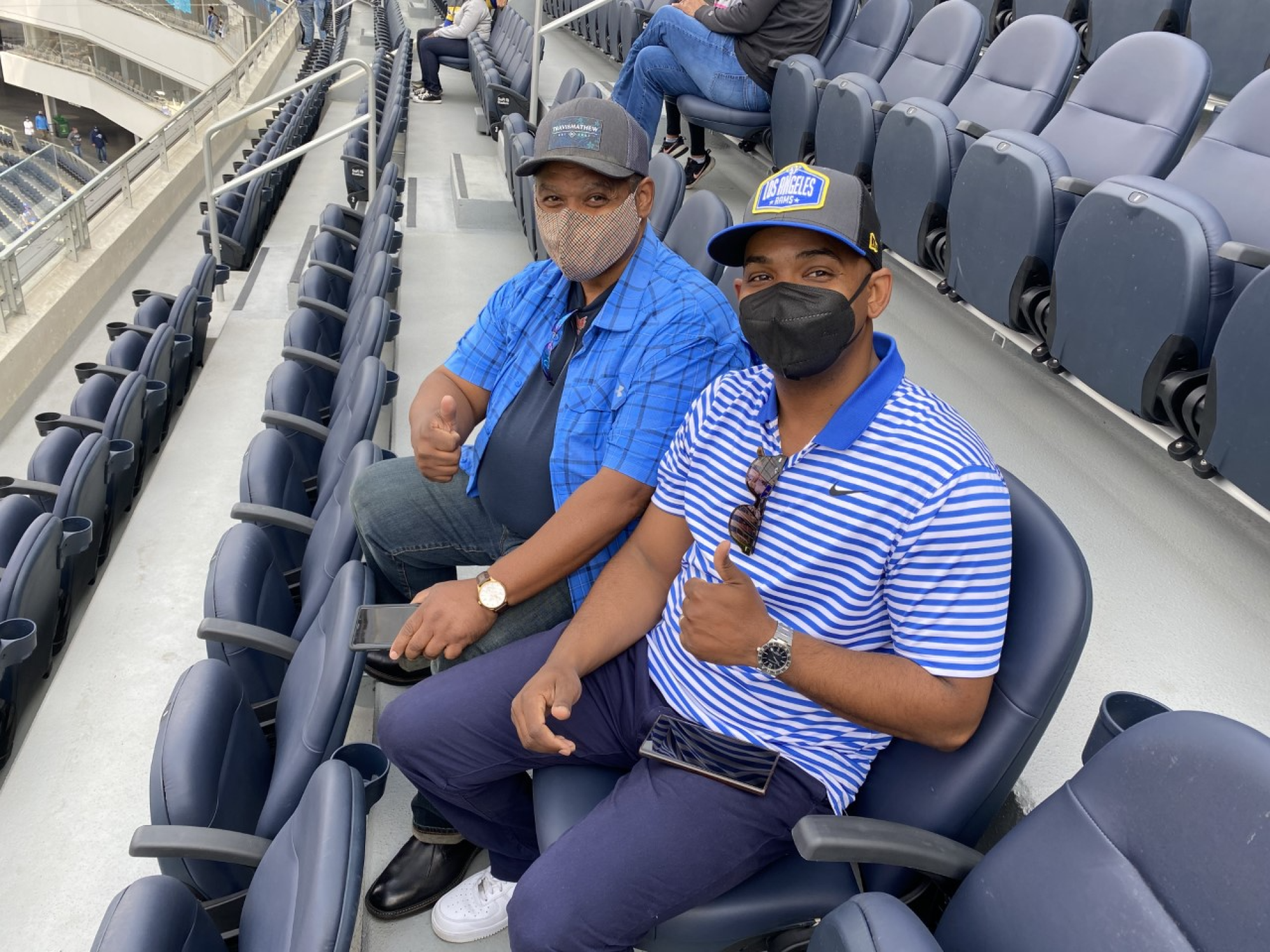 Rams fans Mark Bennett Sr. (Left) and son Mark Bennett Jr. at SoFi Stadium.