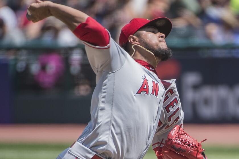 Los Angeles Angels starting pitcher Jaime Barria delivers to Cleveland Indians' Oscar Mercado during the first inning of a baseball game in Cleveland, Sunday, Aug. 4, 2019. (AP Photo/Phil Long)