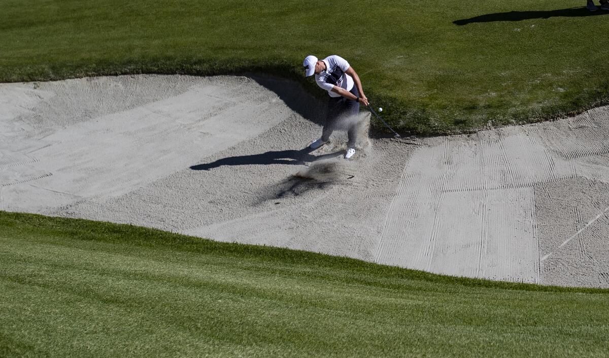 Wyndham Clark hits out of the bunker on the second hole during the second round of the Genesis Invitational at Riviera Country Club.