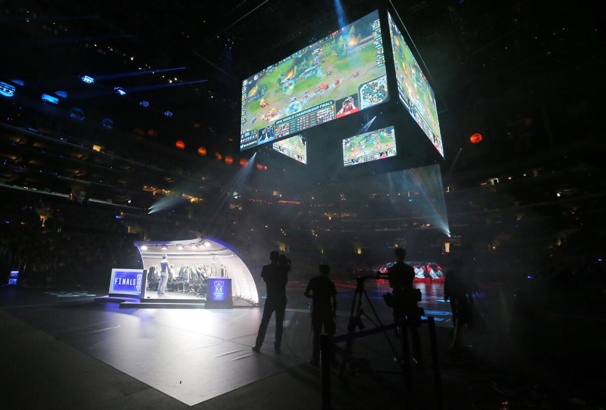The Samsung Galaxy play in a pod across the Staples Center floor from the SK Telecom T1 team during the "League of Legends" World Championship in October.