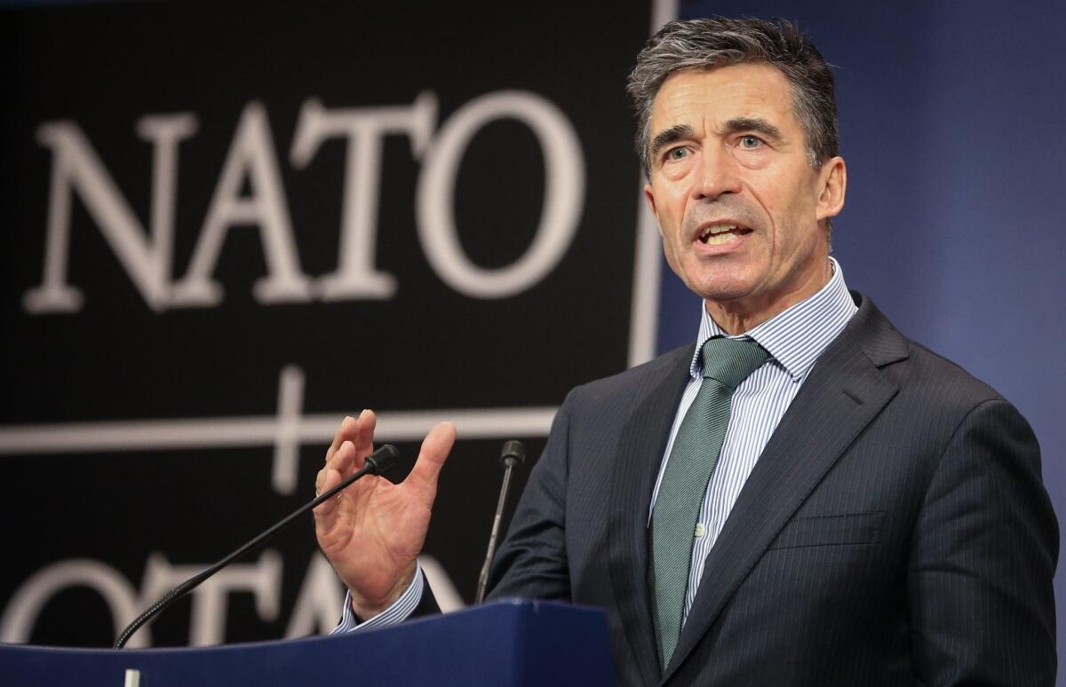 NATO Secretary-General Anders Fogh Rasmussen gives a media briefing at a meeting of the alliance's foreign ministers in Brussels.