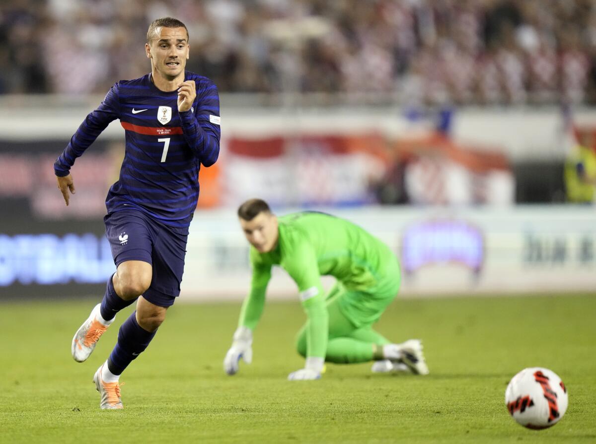 France's Antoine Griezmann runs for the ball during the UEFA Nations League soccer match between Croatia and France at the Poljud stadium, in Split, Croatia, Monday, June 6, 2022. (AP Photo/Darko Bandic)