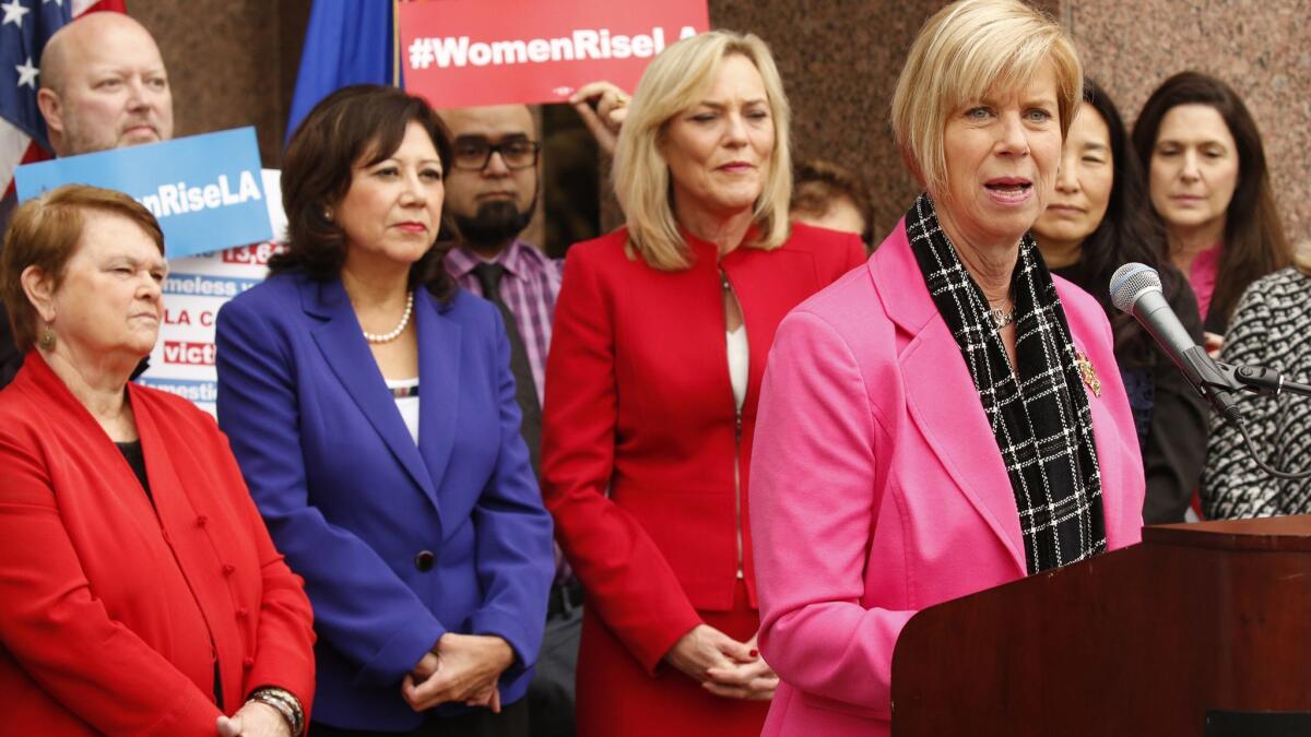 Four of the five seats on the Los Angeles County Board of Supervisors are held by women: Sheila Kuehl, from left, Hilda Solis, Kathryn Barger and Janice Hahn, at microphone, shown in 2016.