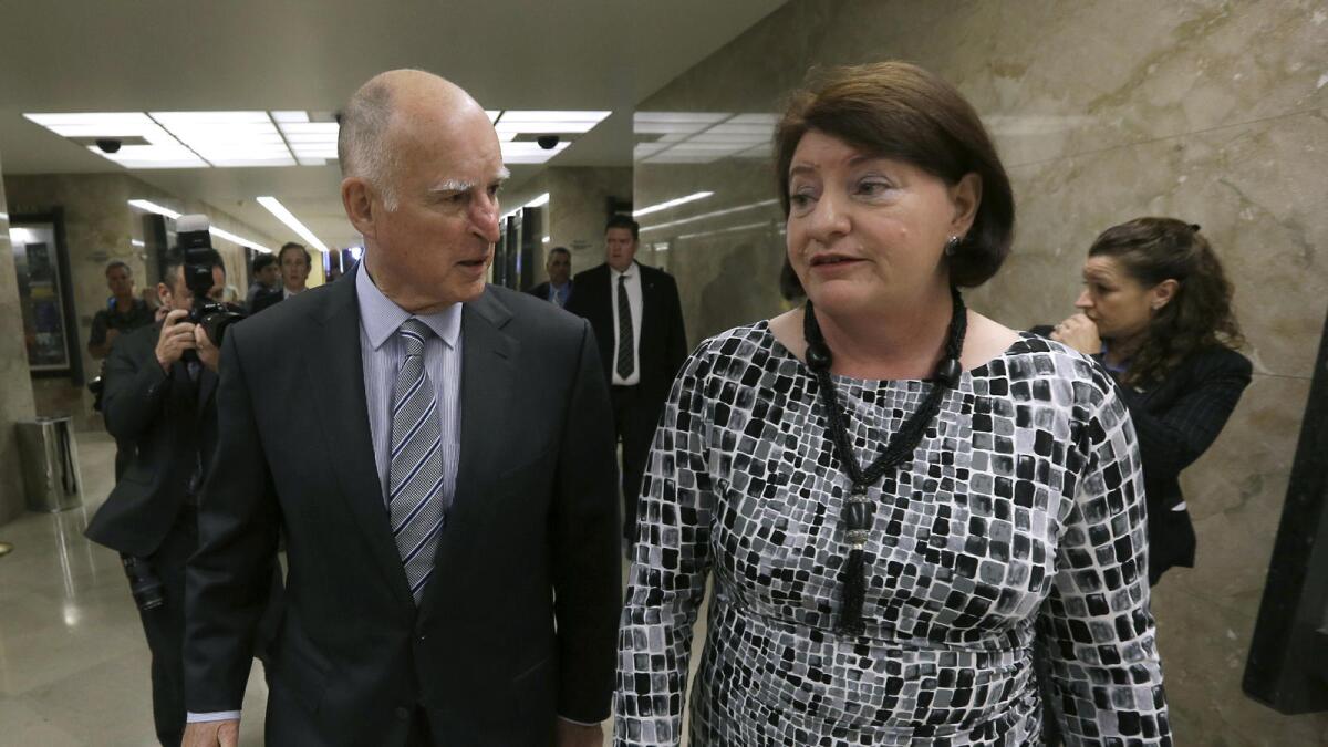Sen. Toni Atkins (D-San Diego) with Gov. Jerry Brown.