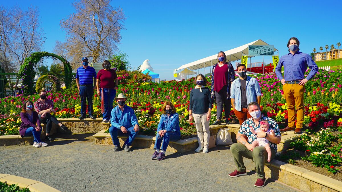 Carlsbad's New Village Arts staff photographed at The Flower Fields at Carlsbad Ranch.