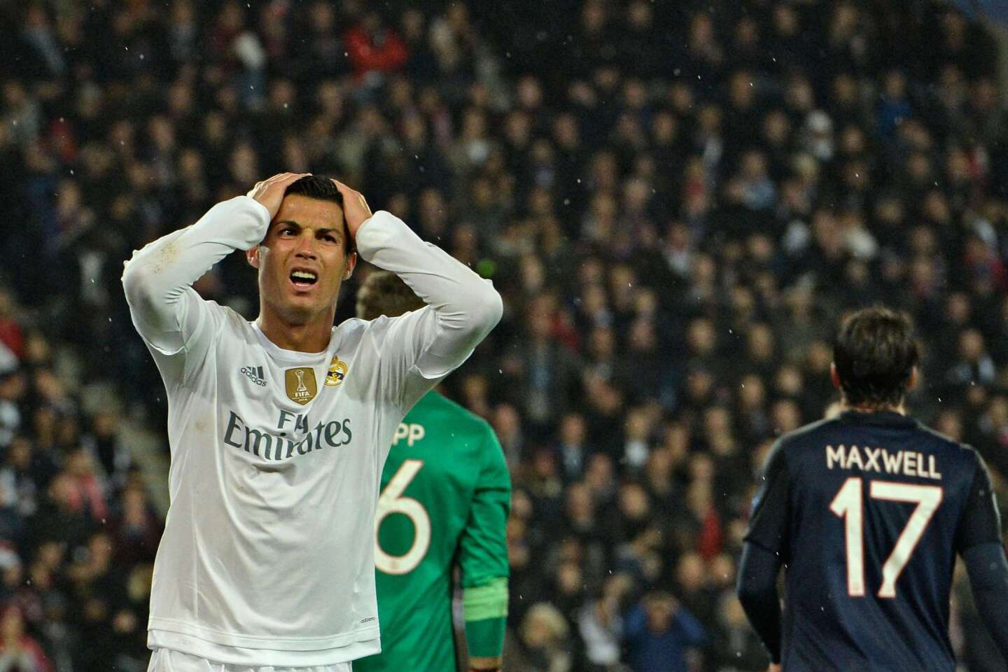 Real Madrid's Portuguese forward Cristiano Ronaldo reacts after missing a goal opportunity during the UEFA Champions League football match Paris Saint-Germain (PSG) vs Real Madrid, on October 21, 2015 at the Parc des Princes stadium in Paris. AFP PHOTO / MIGUEL MEDINAMIGUEL MEDINA/AFP/Getty Images ** OUTS - ELSENT, FPG, CM - OUTS * NM, PH, VA if sourced by CT, LA or MoD **