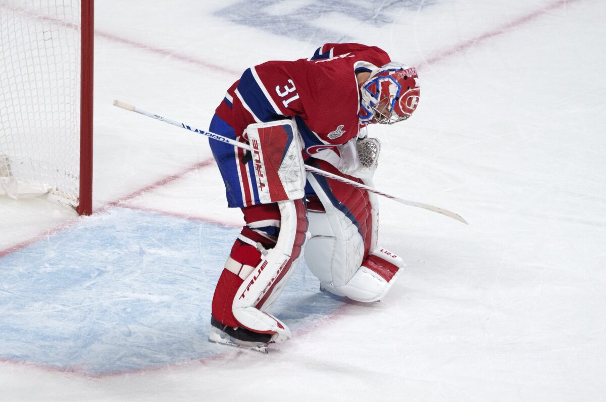Montreal Canadiens goaltender Carey Price sets up in front of the net following a goal by Tampa Bay Lightning's Tyler Johnson during the third period of Game 3 of the NHL hockey Stanley Cup Final, Friday, July 2, 2021, in Montreal. (Paul Chiasson/The Canadian Press via AP)