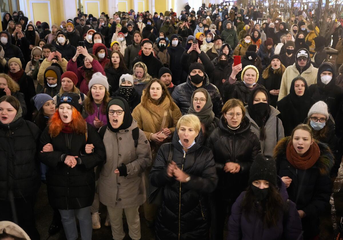 Demonstrators shout slogans in St. Petersburg, Russia