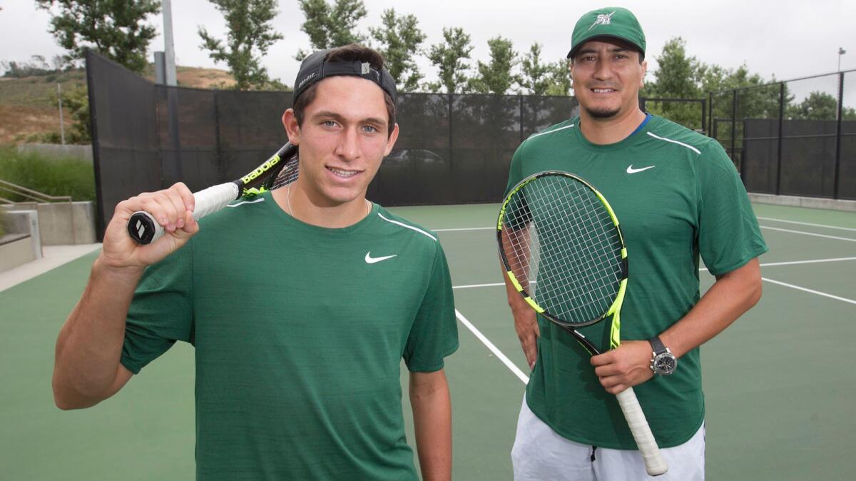 Sage Hill tennis player Adam Langevin, left, stands with head coach Zoran Korac. Langevin has been stellar for the Lightning this year. He is competing in the CIF Individuals tournament.