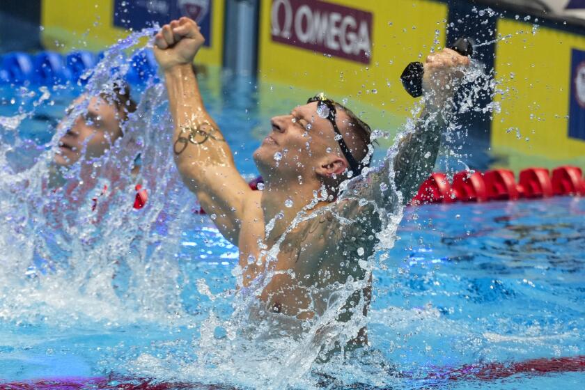 Caeleb Dressel reacts after winning the Men's 100 butterfly finals Saturday, June 22, 2024.