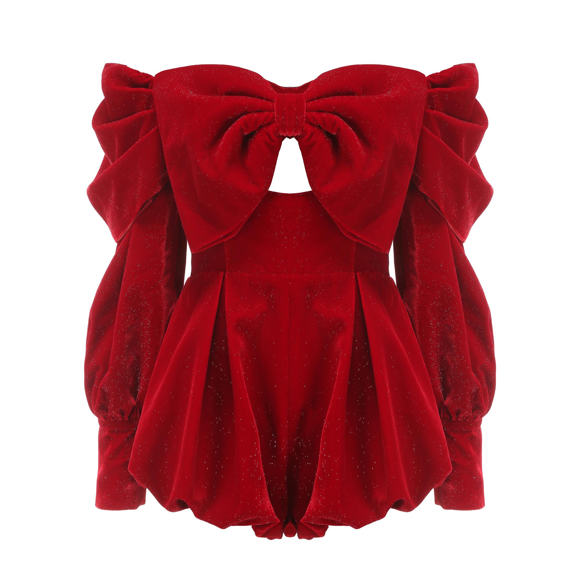 A flouncy red long-sleeved, short-legged jumpsuit with bow neckline.