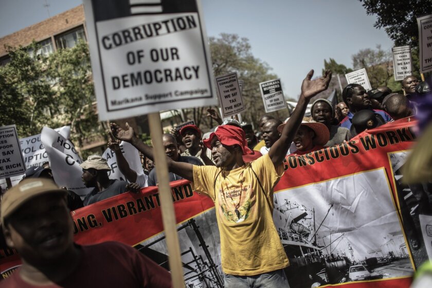 Anticorruption activists march against corruption Wednesday in Pretoria, South Africa.