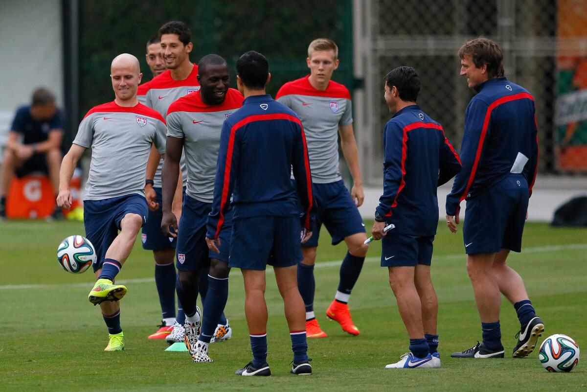 A group of U.S. soccer players runs drills during a training session in Sao Paulo, Brazil.