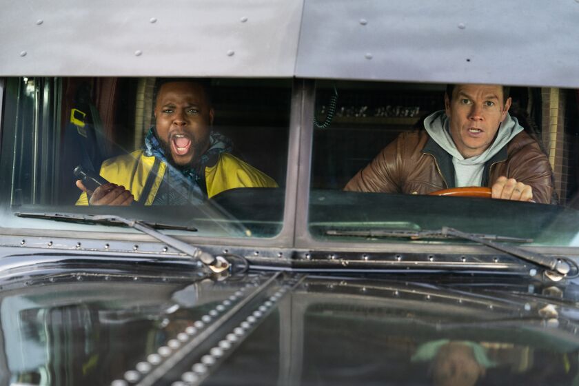 L-R: Winston Duke, who plays "Hawk," and Mark Wahlberg, who plays "Spenser" in a scene from "Spenser Confidential." Credit: Daniel McFadden/Netflix