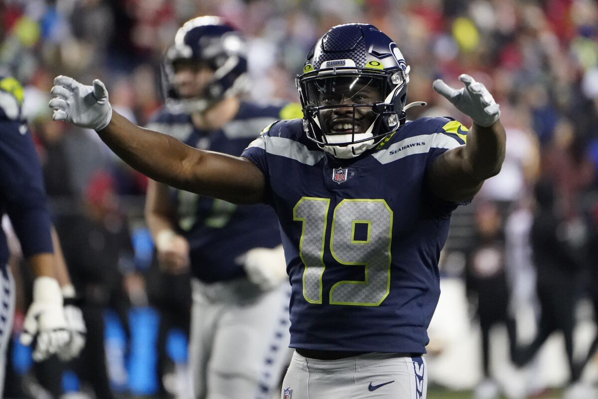 Seattle Seahawks wide receiver Penny Hart (19) celebrates a play late in the second half of an NFL football game against the San Francisco 49ers, Sunday, Dec. 5, 2021, in Seattle. (AP Photo/Elaine Thompson)