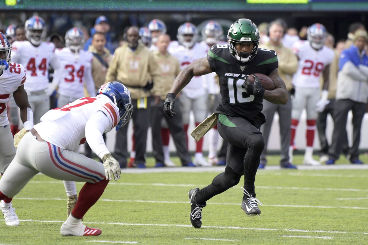 New York Jets wide receiver Demaryius Thomas runs with the ball against the New York Giants in November 2019.