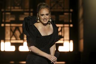 Adele performs at the Griffith Observatory