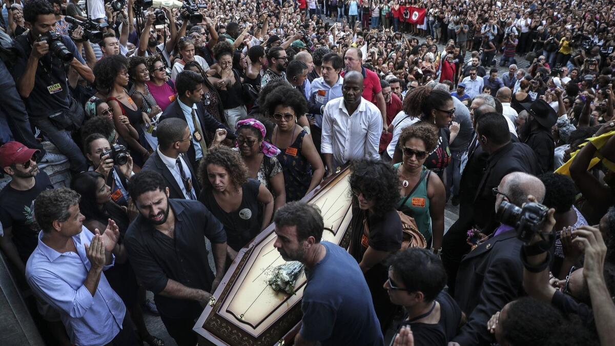 Thousands accompany the coffin of slain councilor Marielle Franco in Rio.