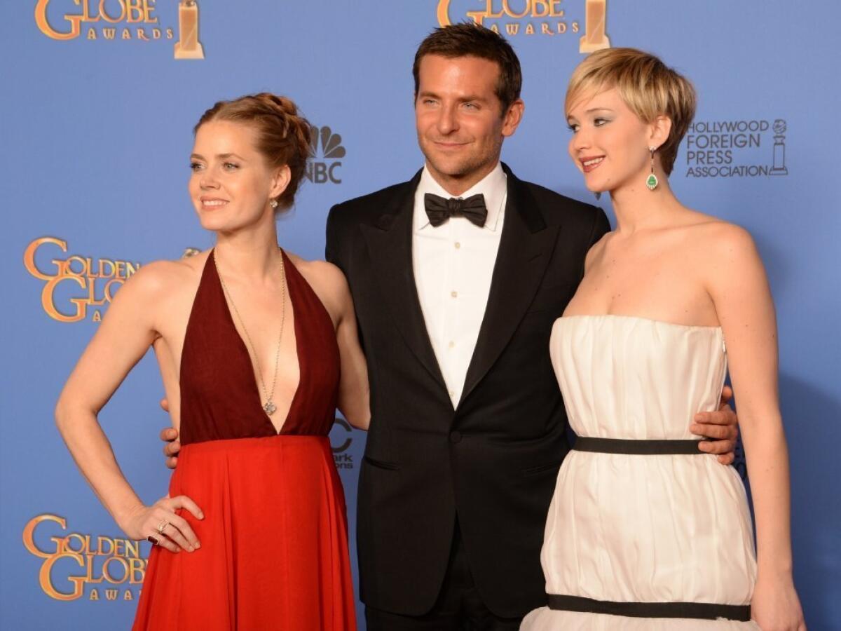"American Hustle stars Amy Adams, Bradley Cooper and Jennifer Lawrence