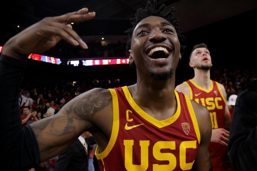 LOS ANGELES, CA - MARCH 7, 2020: USC Trojans guard Jonah Mathews (2) celebrates his game winning 3-point shot to beat UCLA in the final moments at Galen Center on March 7, 2020 in Los Angeles, California. (Gina Ferazzi/Los AngelesTimes)