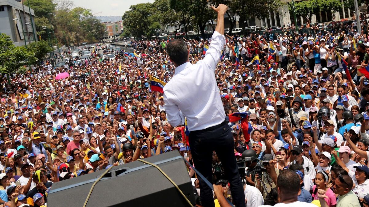 Venezuelan opposition leader Juan Guaido speaks during a demonstration in Caracas on May 1, 2019.