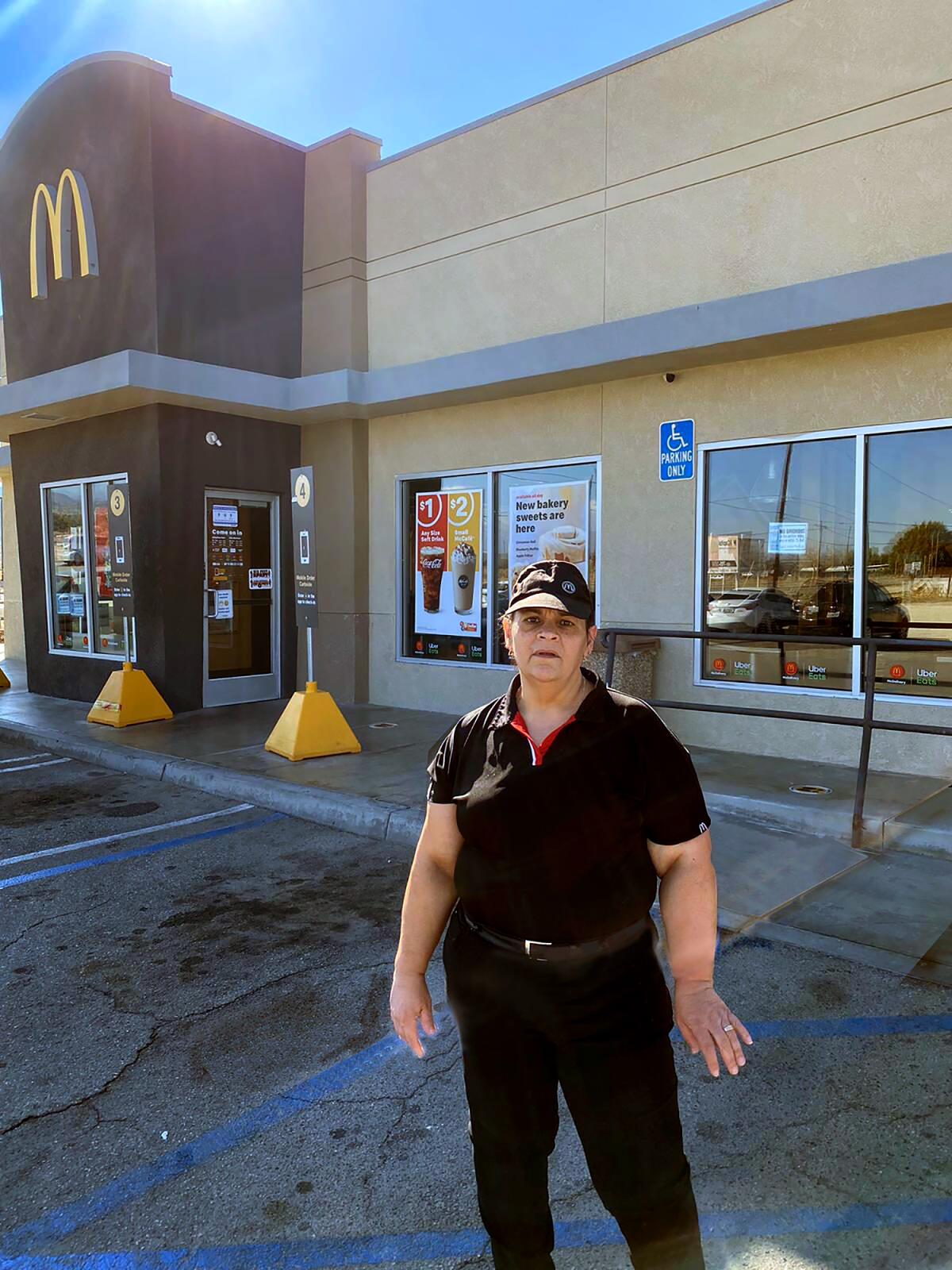 Imelda Rosales at the McDonald's outlet where she has worked for 11 years, in Littlerock, Calif.