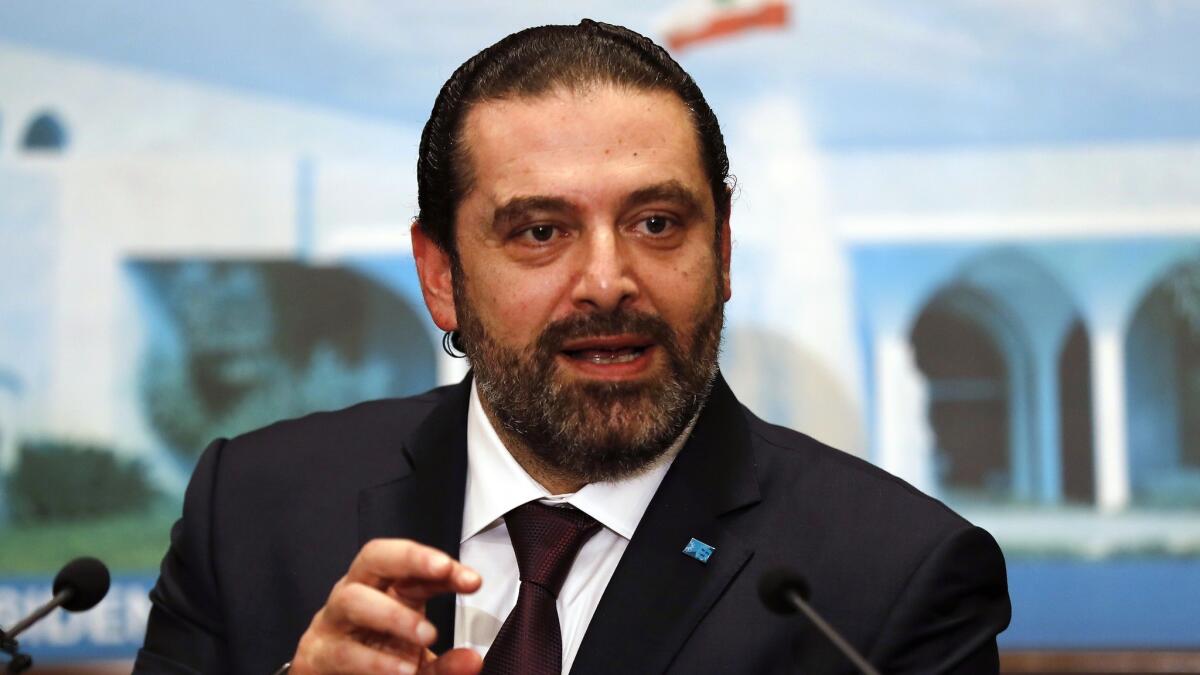 Newly appointed Lebanese Prime Minister Saad Hariri speaks to media at the presidential palace in Baabda on Thursday.