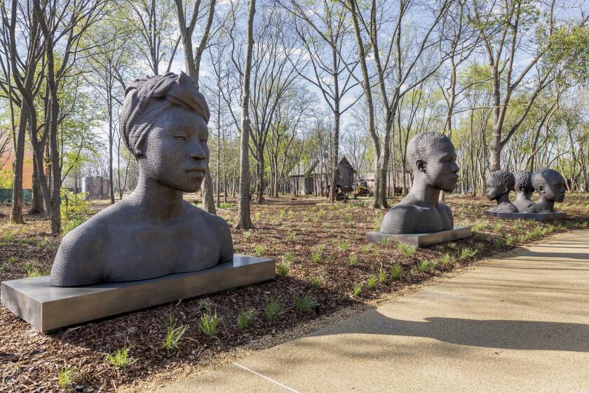 "Black Renaissance," by Rayvenn D'Clark, bronze, 2023, during a media tour of Equal Justice Initiative's new Freedom Monument Sculpture Park, Tuesday, March 12, 2024, in Montgomery, Ala. (AP Photo/Vasha Hunt)