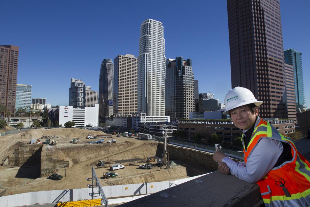 I Fei Chang, president and CEO of Chinese real estate developer Greenland USA, in November looking over the site of its $1-billion Metropolis Los Angeles hotel and condo project, under construction in its first phase.