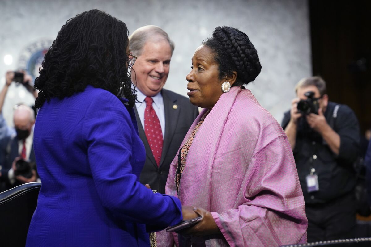 Supreme Court nominee Ketanji Brown Jackson talks with Rep. Sheila Jackson Lee