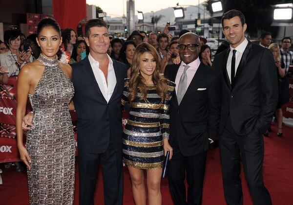 "The X Factor" judges hit the red carpet in Hollywood on Wednesday night to celebrate the Sept. 21 premiere of the new reality competition. From left, Nicole Scherzinger, Simon Cowell, Paula Abdul and L.A. Reid.