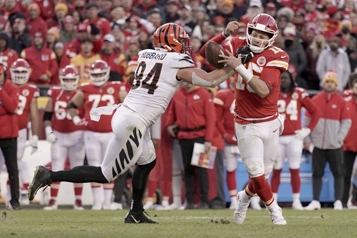 The Chiefs' Patrick Mahomes (15) fumbles while being sacked by the Bengals' Sam Hubbard in the AFC championship last year.