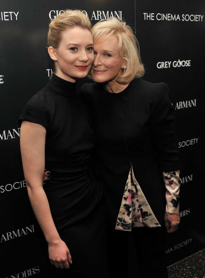 Mia Wasikowska, left, poses with her co-star and producer Glenn Close before the Giorgio Armani & Cinema Society screening of their film "Albert Nobbs." The film screened at the Museum of Modern Art in New York City on Tuesday.