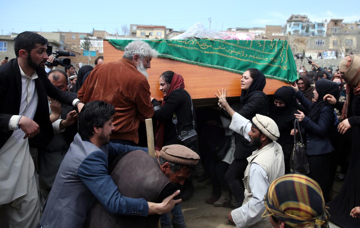 Women's rights activists on March 22 carry the coffin of 27-year-old Farkhunda, who was killed by a mob.