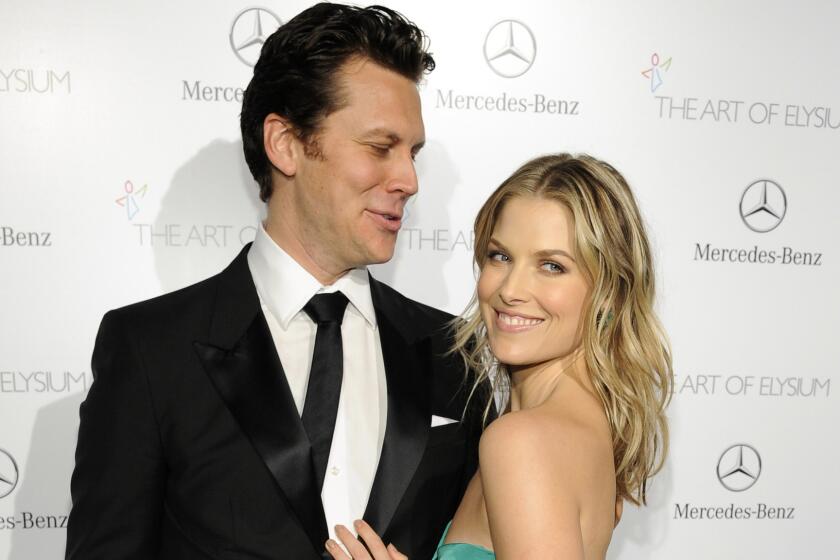 Actress Ali Larter and husband Hayes MacArthur pose at the Art of Elysium's Heaven Gala on Jan. 11, 2014, in Los Angeles.