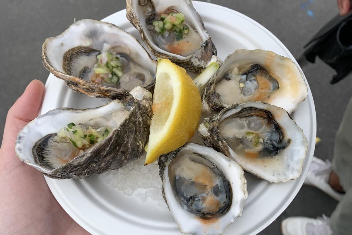 Visitors to Los Angeles' Sunday Smorgasburg market can grab oysters sourced from owner Mark Reynolds' Baja California farm.
