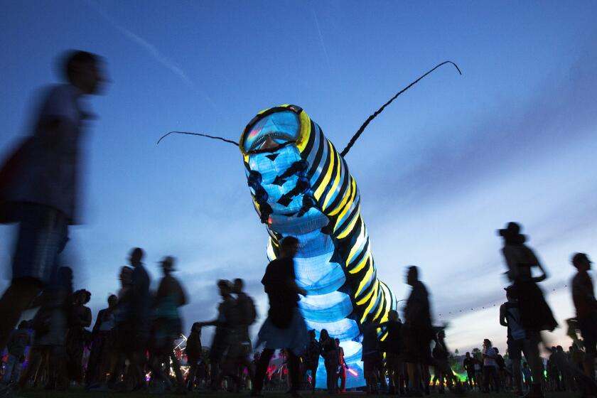 Available to all who attend Coachella: The giant caterpillar art installation by Poetic Kinetics.