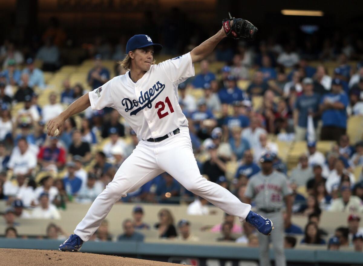 Dodgers starter Zack Greinke delivers a pitch against the Mets in the first inning of Game 5 on Oct. 15 at Dodger Stadium.
