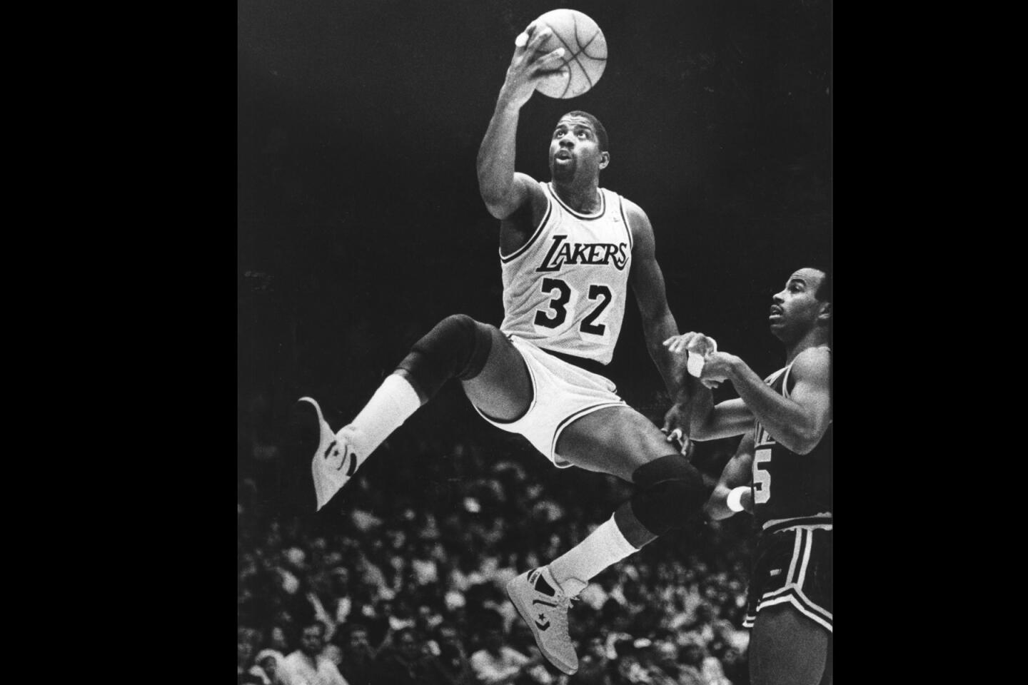 Hall of Famer Earvin "Magic" Johnson led the Lakers to five NBA titles before his shocking retirement due to HIV. After his retirement, Johnson continued to have an active role in L.A. sports and beyond.