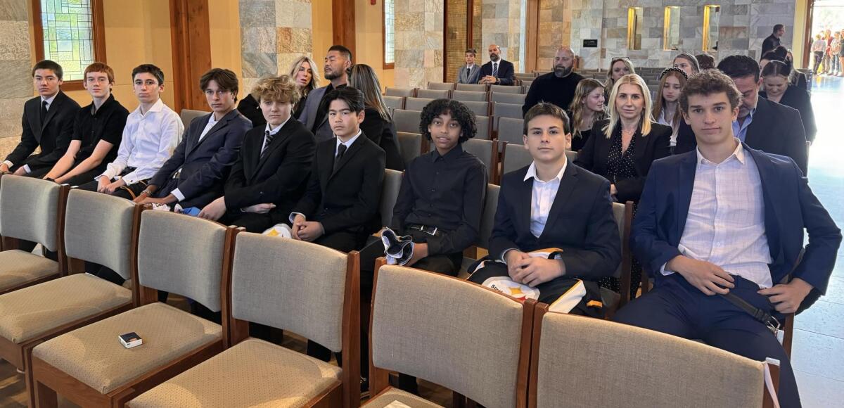 Members of Tim Hicks' flag football team attended his memorial service last fall.