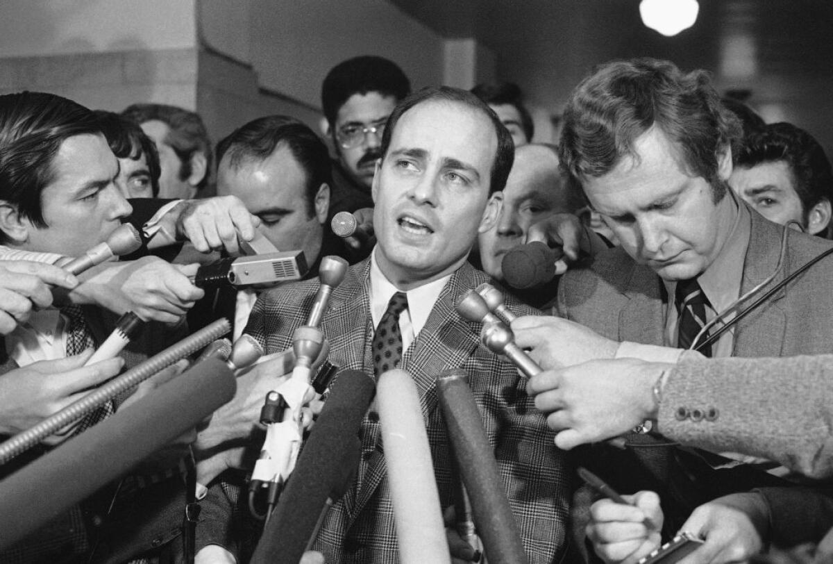 Chief prosecutor Vincent Bugliosi speaks to reporters in 1971 after Charles Manson and three followers were found guilty of multiple murders.