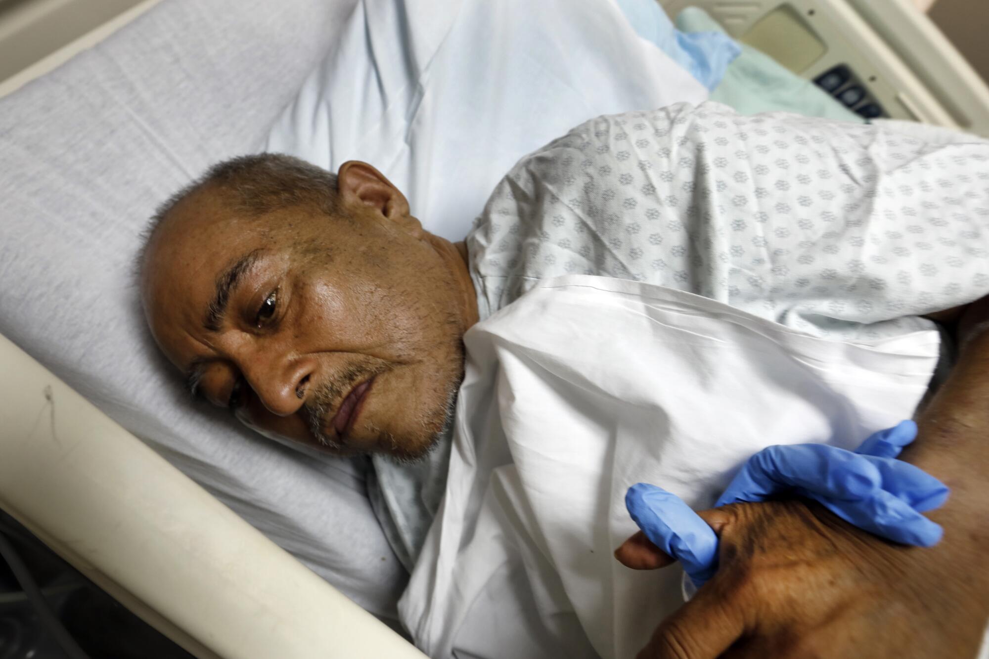 Luis Florez, 59, already suffered from cirrhosis before he contracted COVID-19, putting him at added risk. 