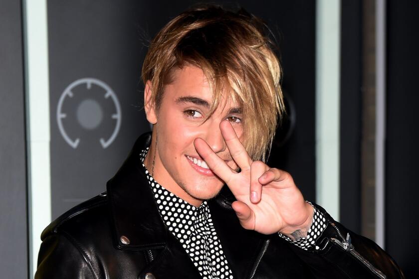 Singer Justin Bieber arrives Sunday for the 2015 MTV Video Music Awards. The show helped generate the highest increase in music streams for the artist following the show, according to Spotify.