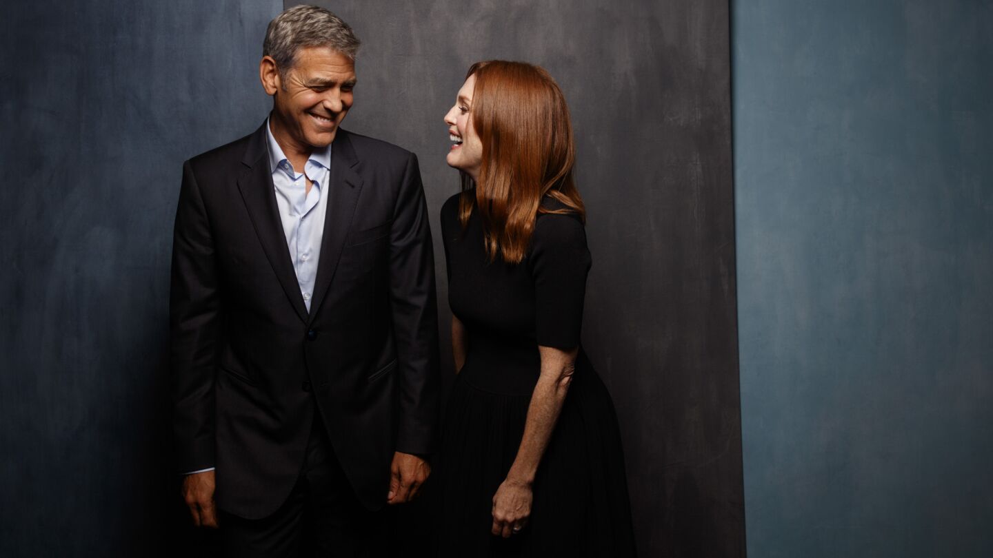 Director George Clooney and actress Julianne Moore, from the film "Suburbicon."